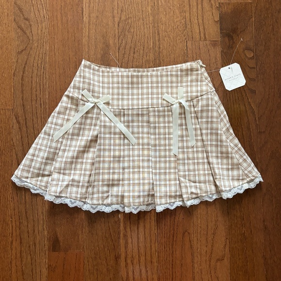 Altar'd State Dresses & Skirts - Altar’d state plaid beige mini pleated skirt bows and lace trim XXS